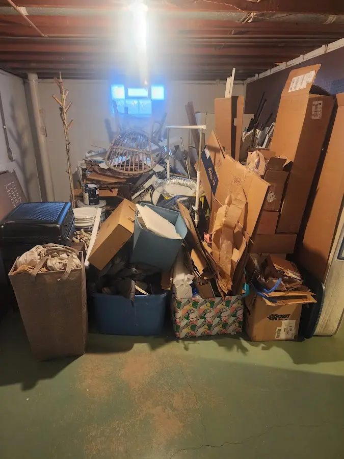 Roll-off dumpster container at job site for 20 Yard Dumpster Rental in Waycross